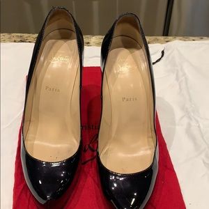 Christian Louboutin black pumps